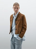Veste avec poches en cuir effet daim