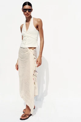 FOULARD AVEC LIN ET POMPONS