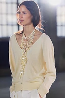 PULL EN MAILLE À BOUTONS