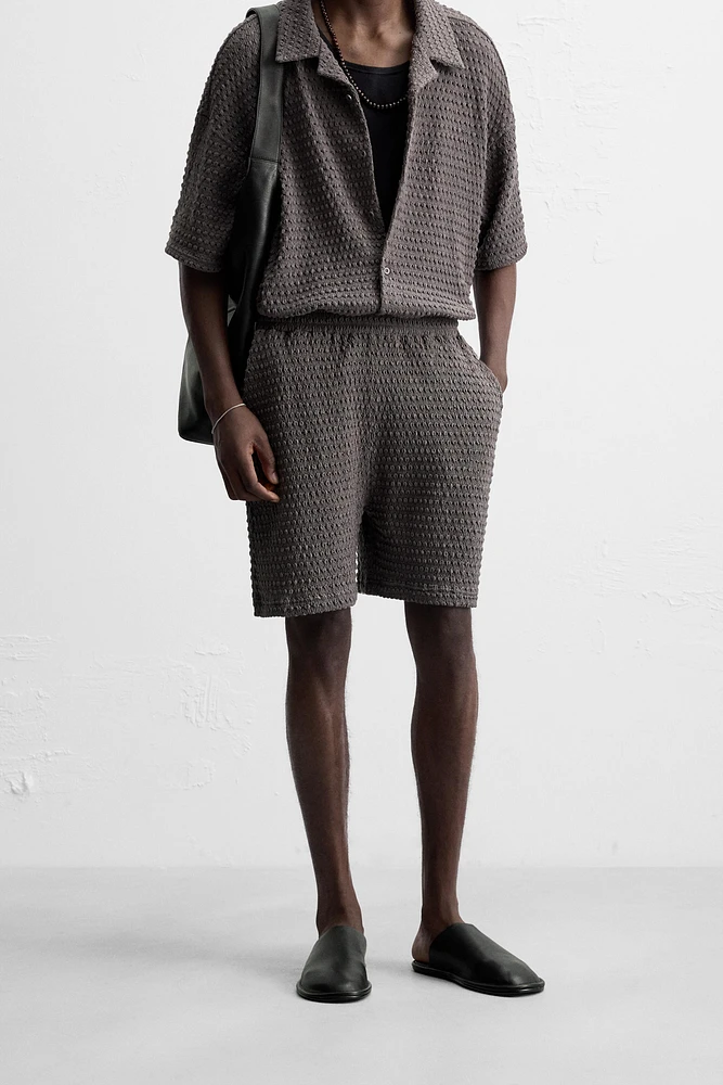IRREGULAR TEXTURED BERMUDA SHORTS