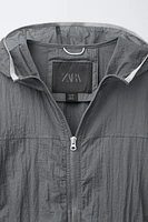 LIGHTWEIGHT PACKABLE WINDBREAKER