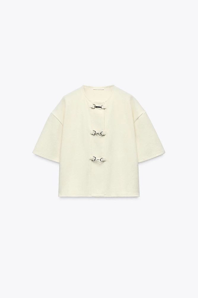 BUCKLE SHORT SLEEVE TOP