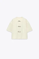 BUCKLE SHORT SLEEVE TOP