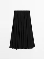 Voluminous pleated midi skirt