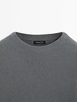 Pull en maille à col montant