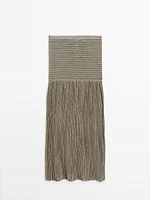 Long pleated skirt with flecked detail