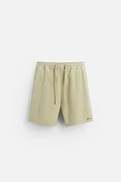 TEXTURED EMBROIDERED SHORTS