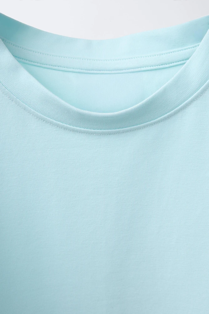 THREE-PACK OF BASIC SLEEVELESS T-SHIRTS