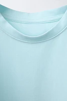 THREE-PACK OF BASIC SLEEVELESS T-SHIRTS