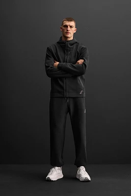 TECHNICAL ZIP SWEATSHIRT