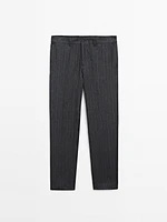 Faded 100% linen striped trousers