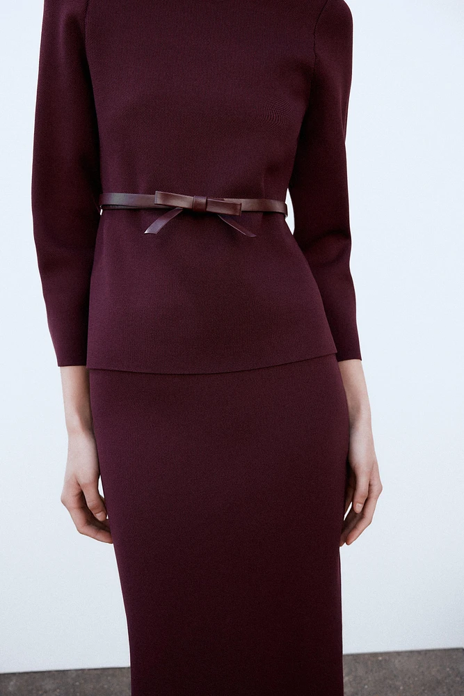 BELTED KNIT TOP