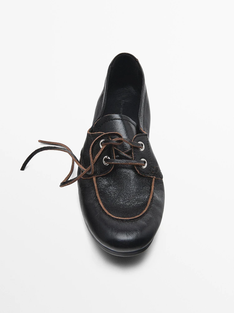 Shiny leather deck shoes