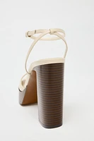 LEATHER PLATFORM HEELED SANDALS