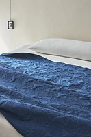 CONTRAST QUILT WITH RAISED FLORAL DESIGN