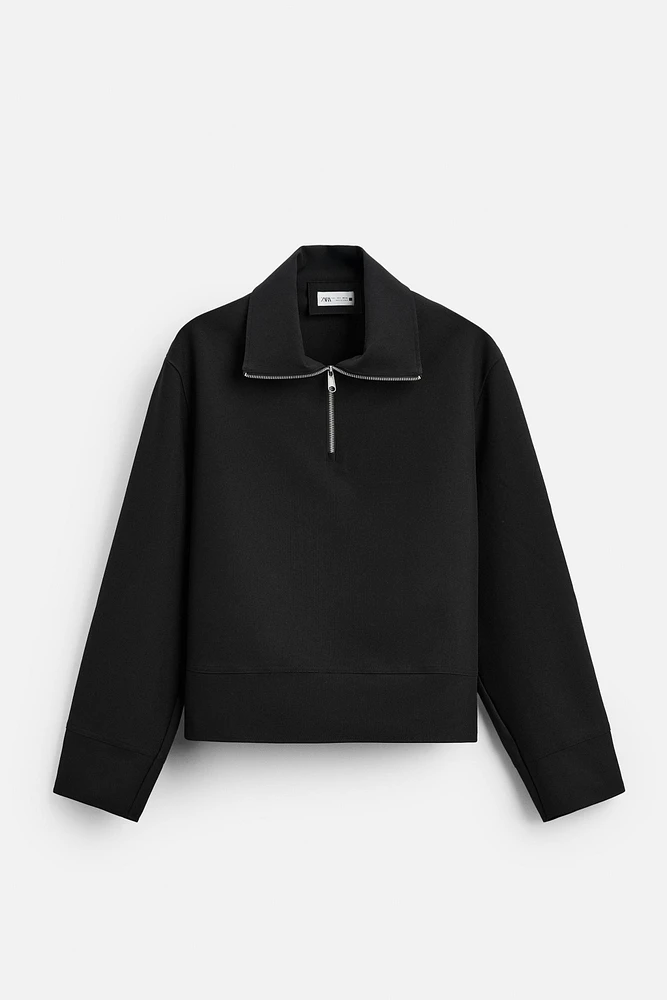TECHNICAL QUARTER-ZIP SWEATSHIRT
