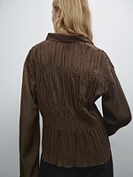 Flowing shirt with gathered details