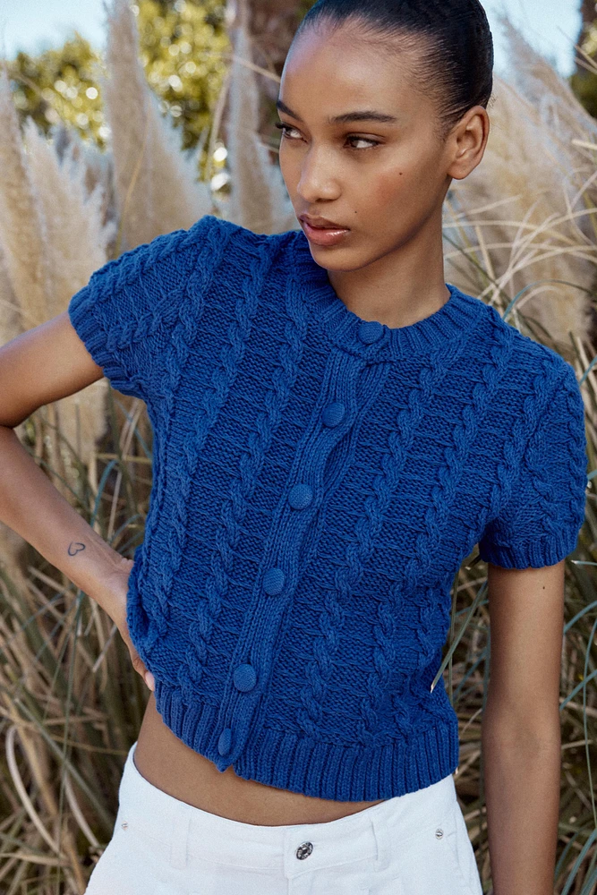 GILET EN MAILLE À MANCHES COURTES