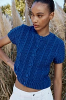 GILET EN MAILLE À MANCHES COURTES