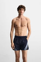 CONTRAST BANDS MID-LENGTH SWIMSUIT