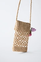 RAFFIA EFFECT PHONE CASE WITH CHARM