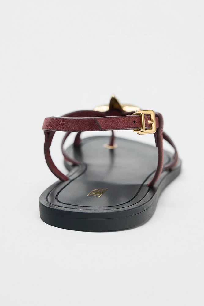 STRAPPY SANDALS WITH METALLIC DETAIL
