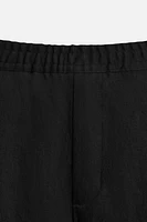 FLOWY PLEATED PANTS