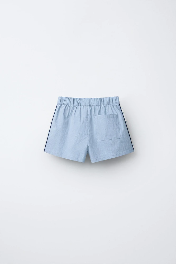 COMBINATION FLORAL TECHNICAL SHORTS