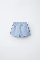 COMBINATION FLORAL TECHNICAL SHORTS