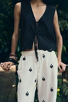 LINEN VEST WITH PERFORATED EMBROIDERY