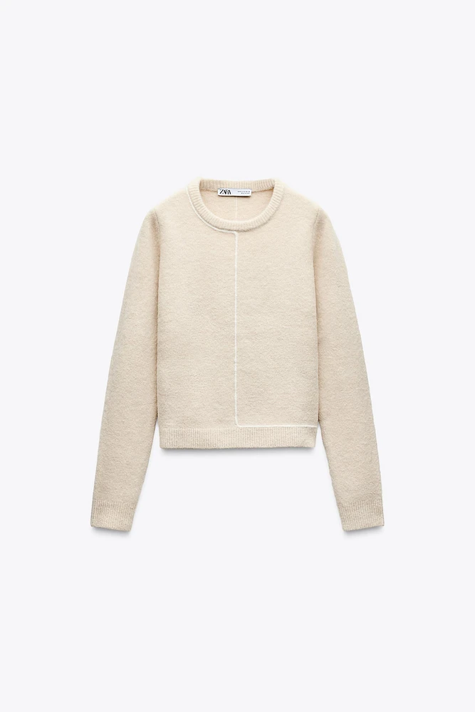 KNIT SWEATER WITH CONTRASTING PIPING