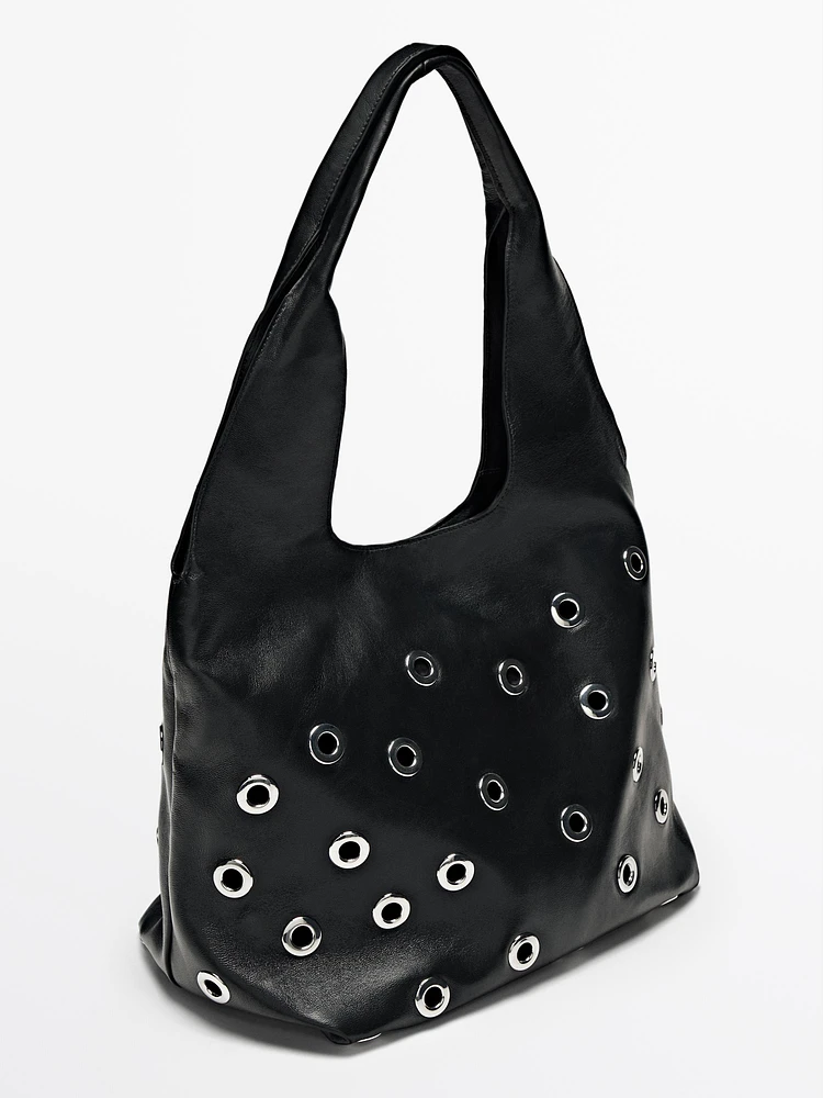 Nappa leather bag with eyelets