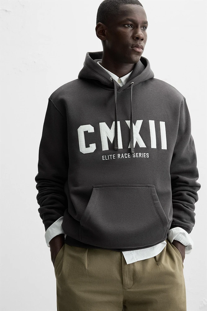 HOODED SWEATSHIRT WITH TEXT