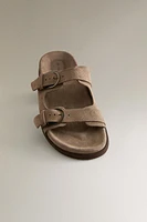 FLAT LEATHER SANDALS WITH BUCKLES