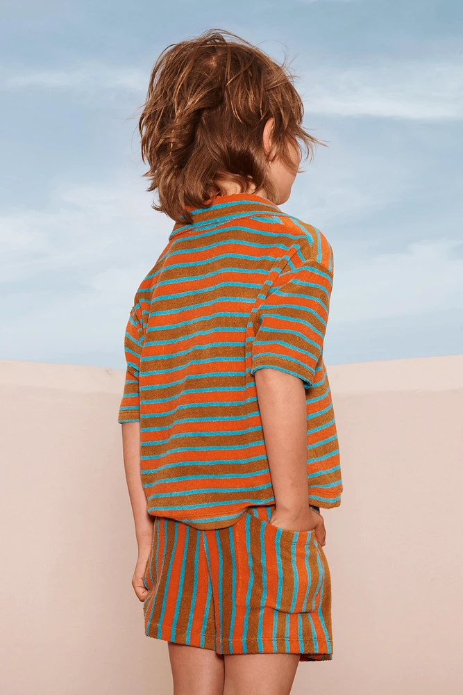 CHEMISE POLO EN TISSU ÉPONGE À RAYURES ÉDITION LIMITÉE