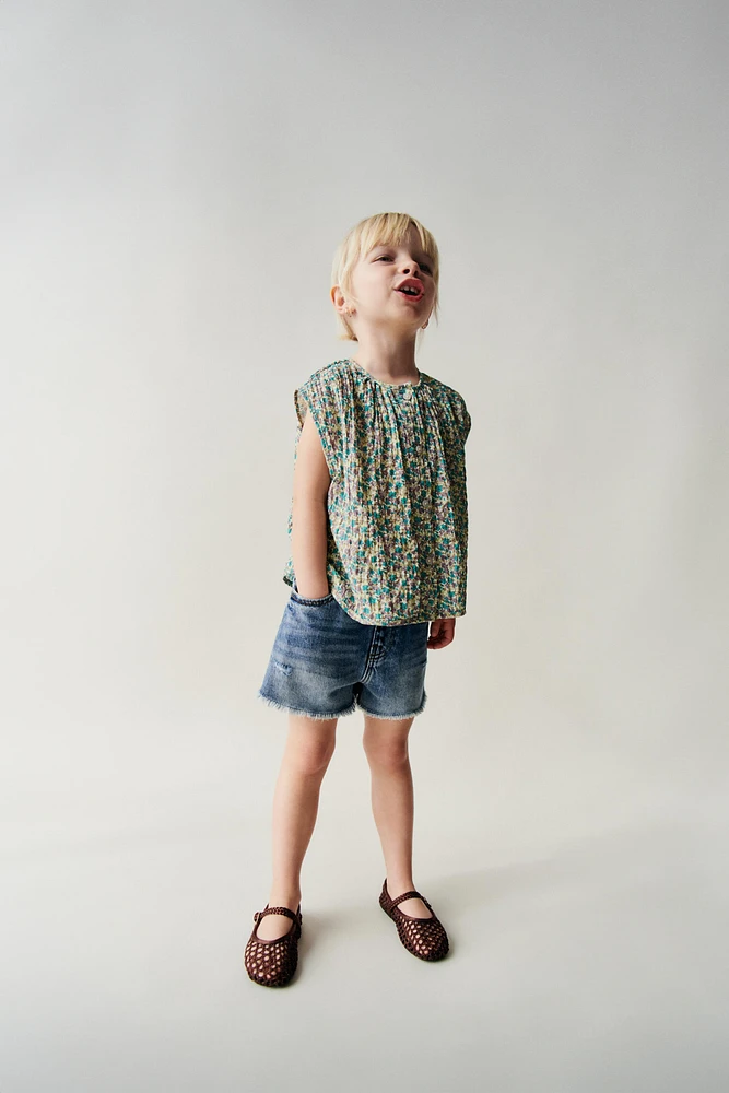 BERMUDA EN DENIM HIGH WAIST DÉCHIRÉ