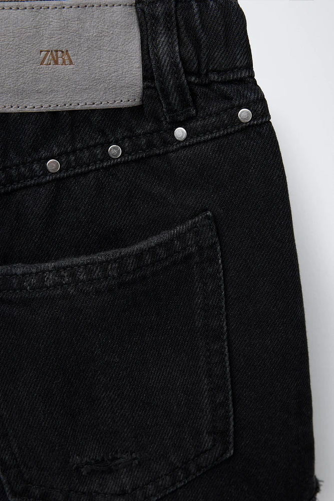 RIPPED DENIM SHORTS WITH STUDS
