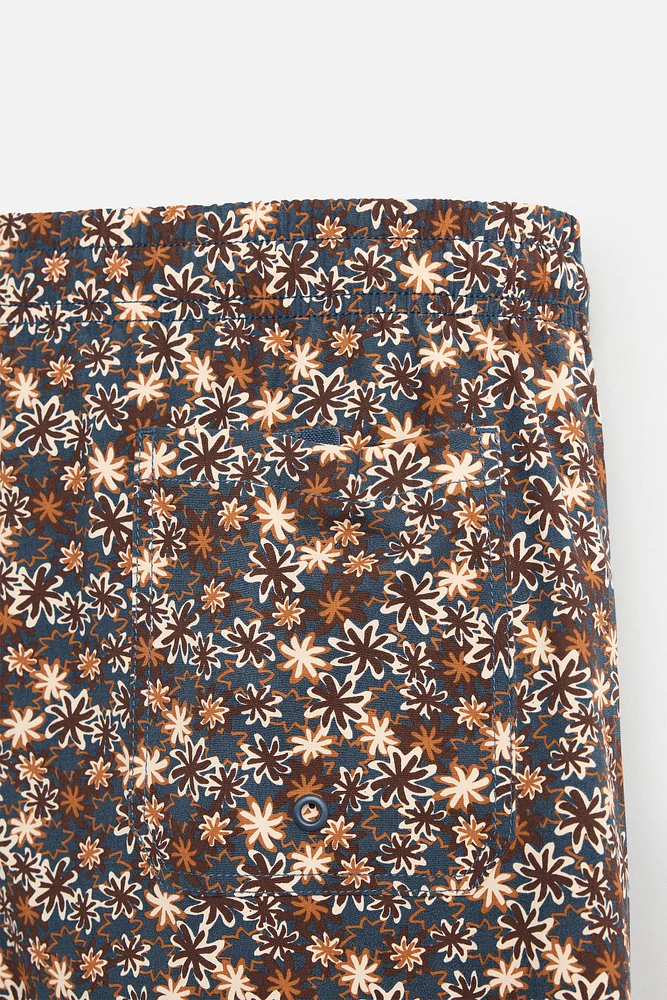 FLORAL PRINT MID-LENGTH SWIMSUIT