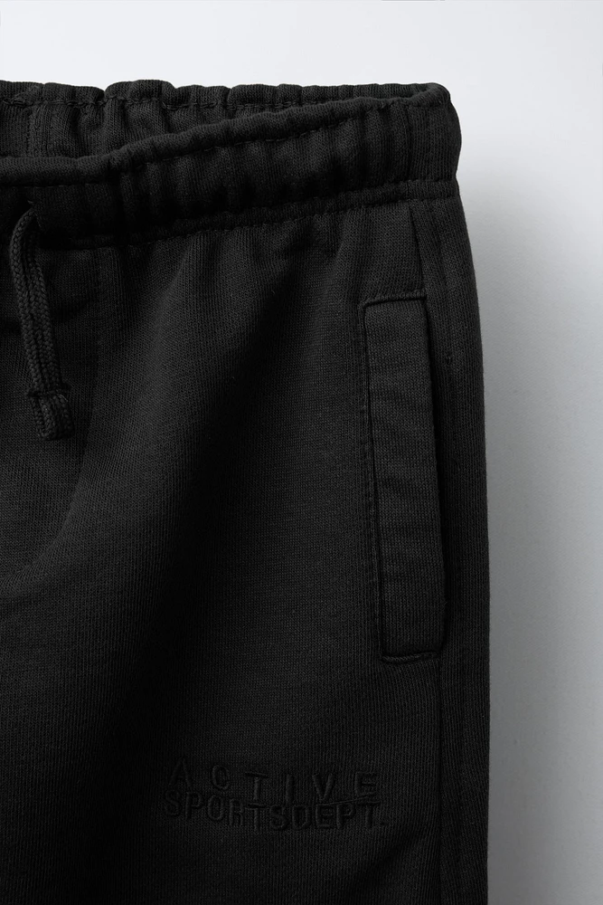 EMBROIDERED TEXT JOGGER PANTS