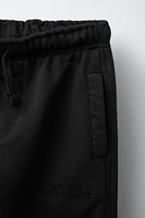 EMBROIDERED TEXT JOGGER PANTS