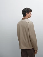 Short jacket with leather collar detail