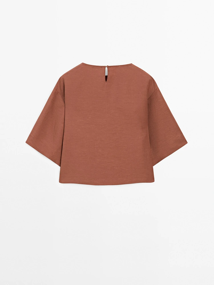 Flowing top with embroidered detail