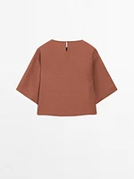 Flowing top with embroidered detail