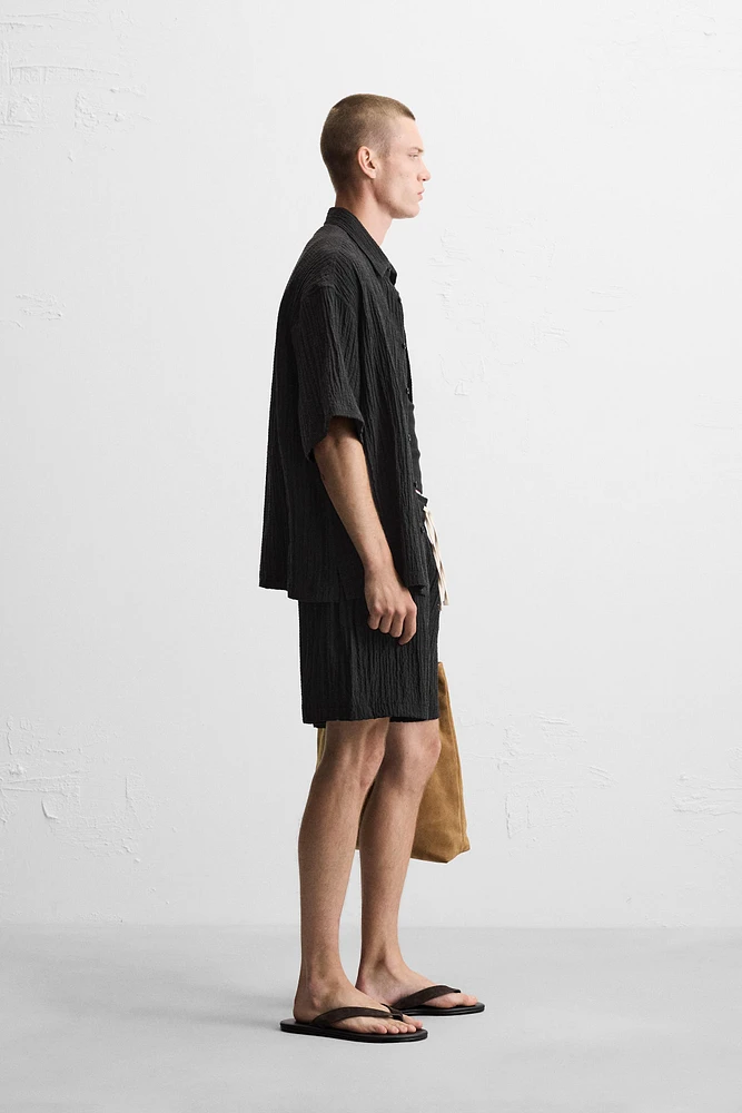 WRINKLED EFFECT JACQUARD BERMUDA SHORTS