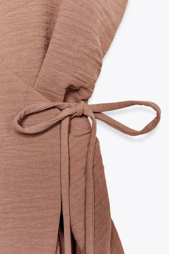 FLOWY WRAP VEST TOP