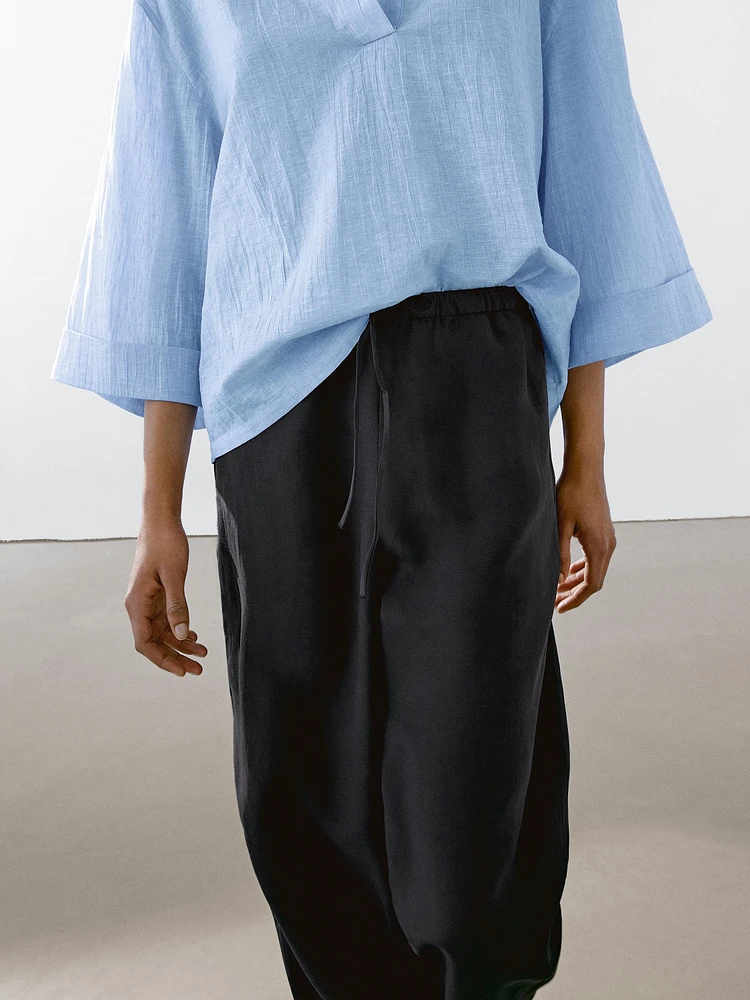 Flowing linen blend barrel fit trousers