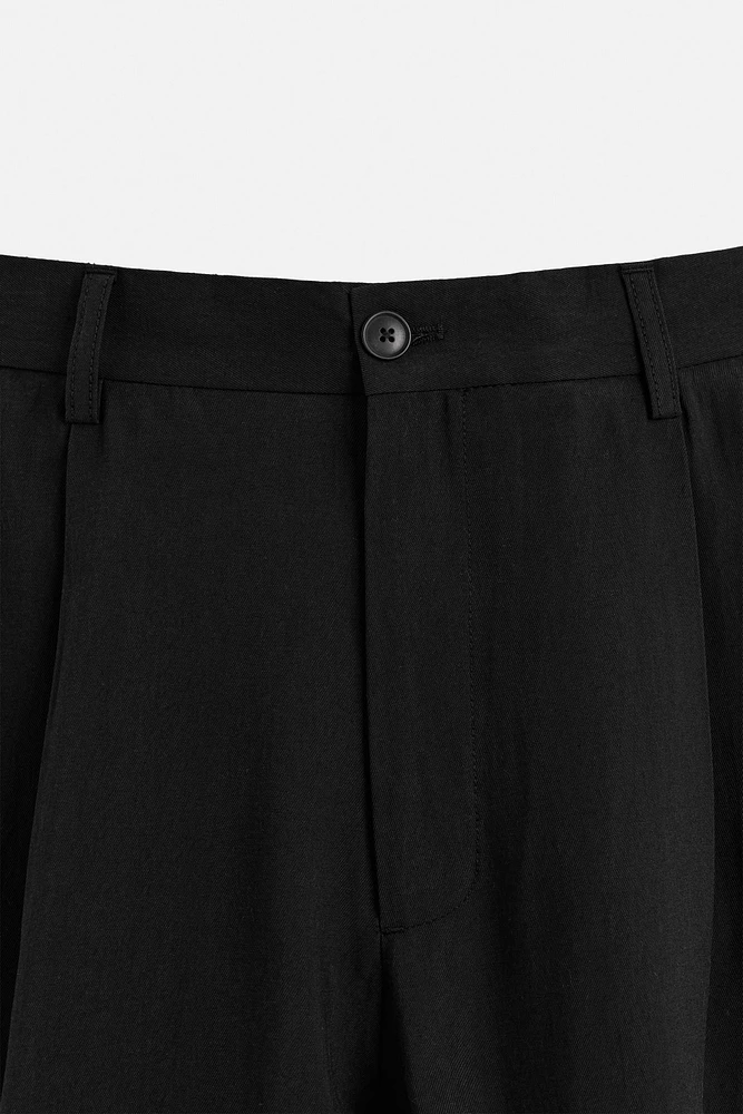 FLOWY PLEATED PANTS