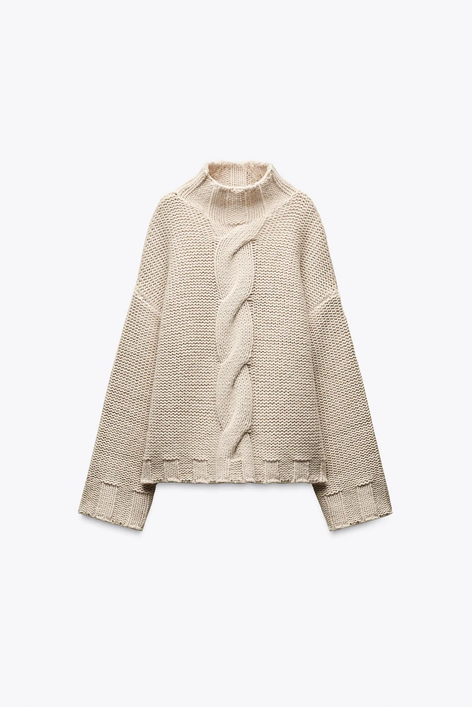 PULL EN MAILLE À TORSADES