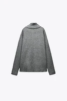 PULL EN MAILLE À COL MONTANT