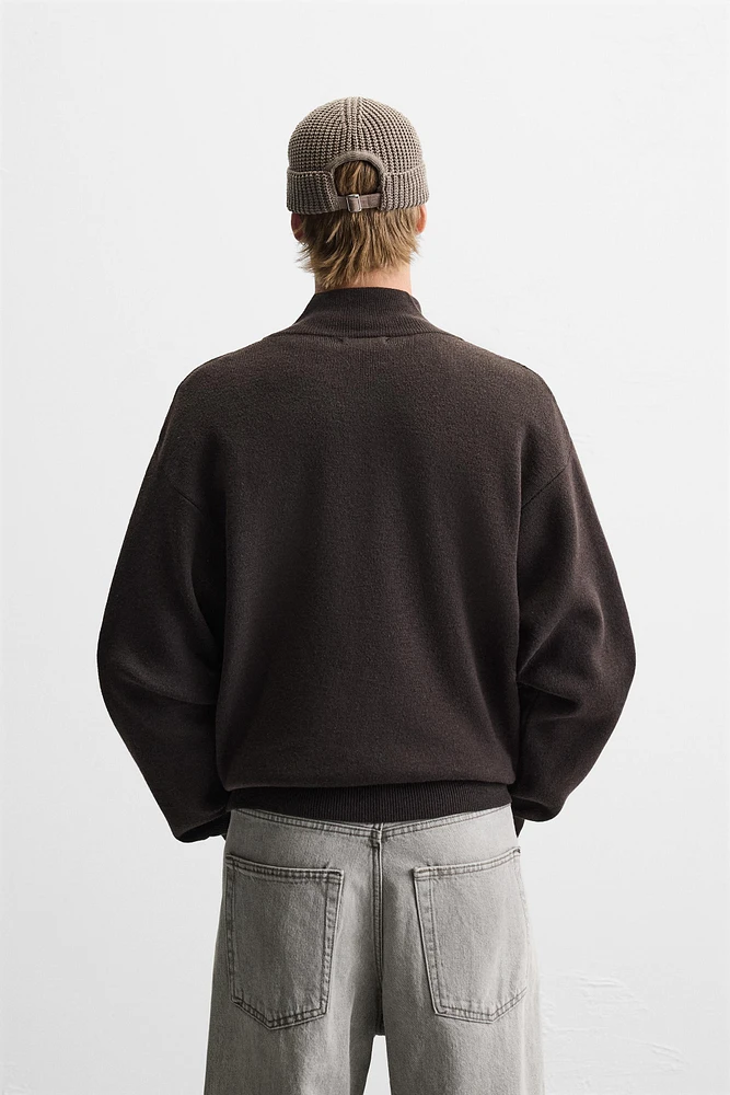 QUARTER ZIP SWEATER